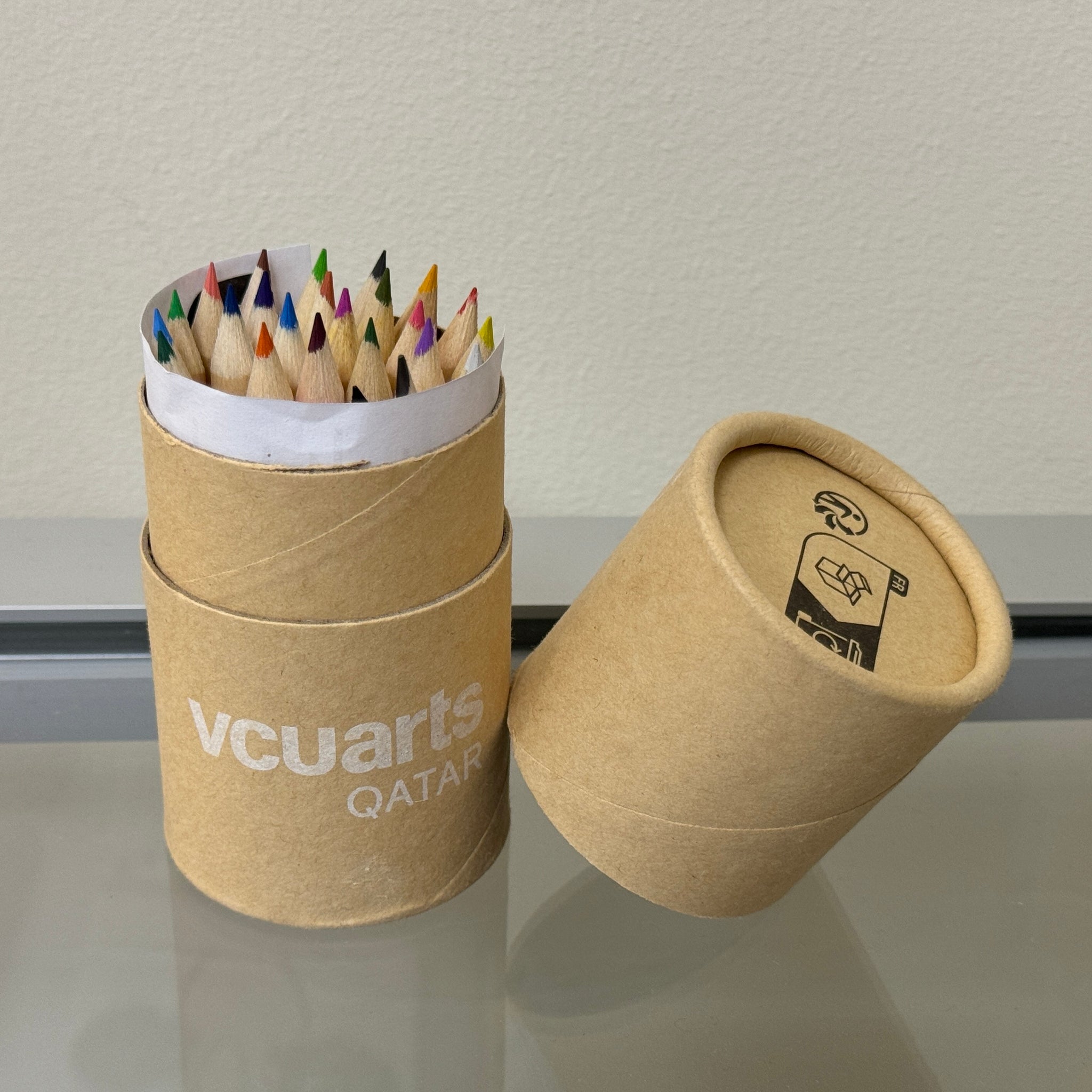 VCUarts wooden box with pencils, eraser, pen sharpener